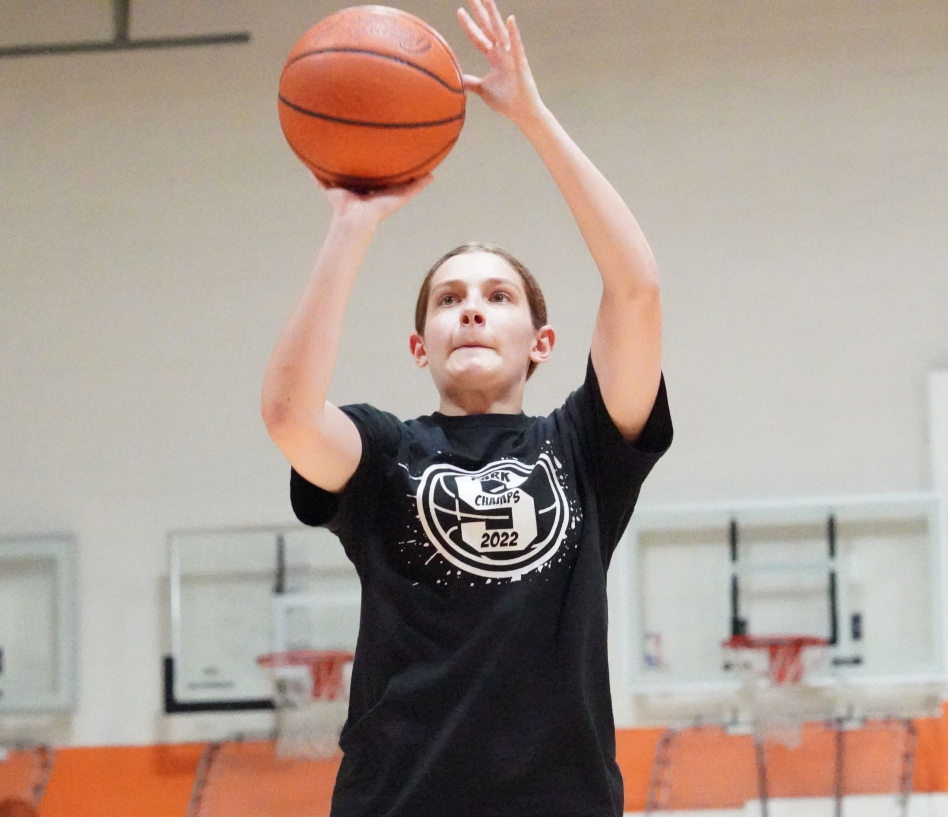 Youth basketball shooting form training at The Factory
